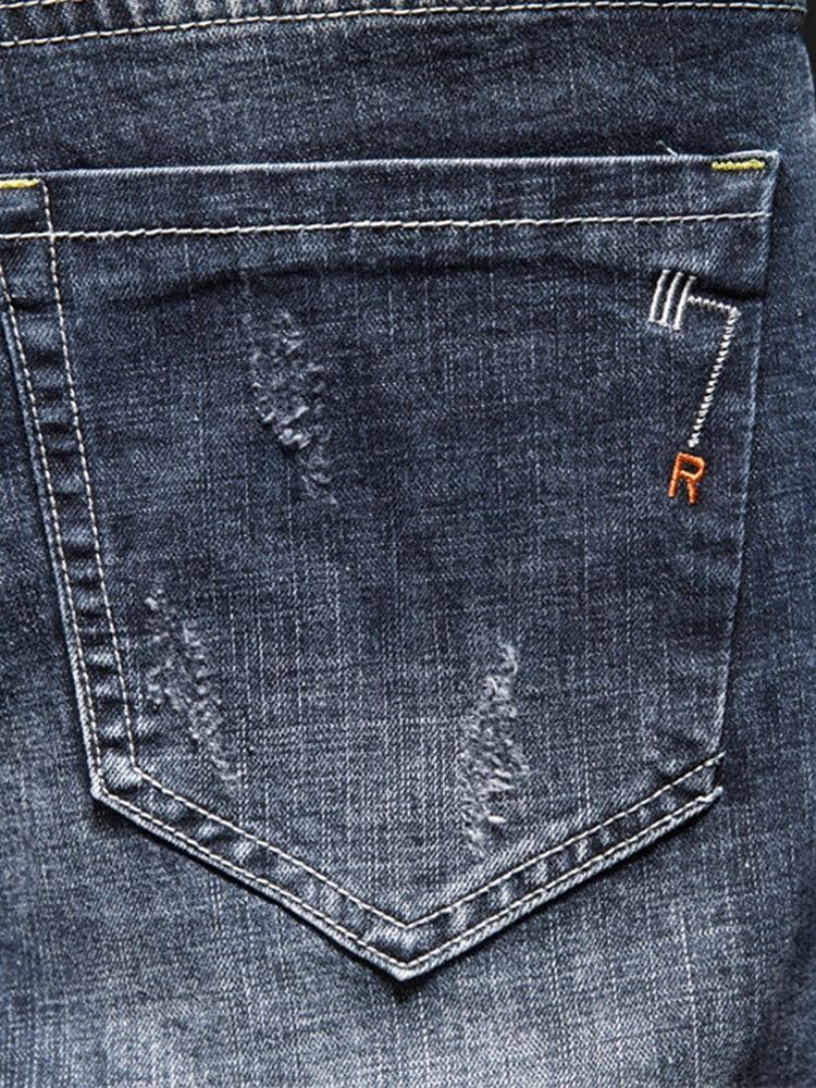 Vanligt Hål Mode Jeans Med Mid Midja