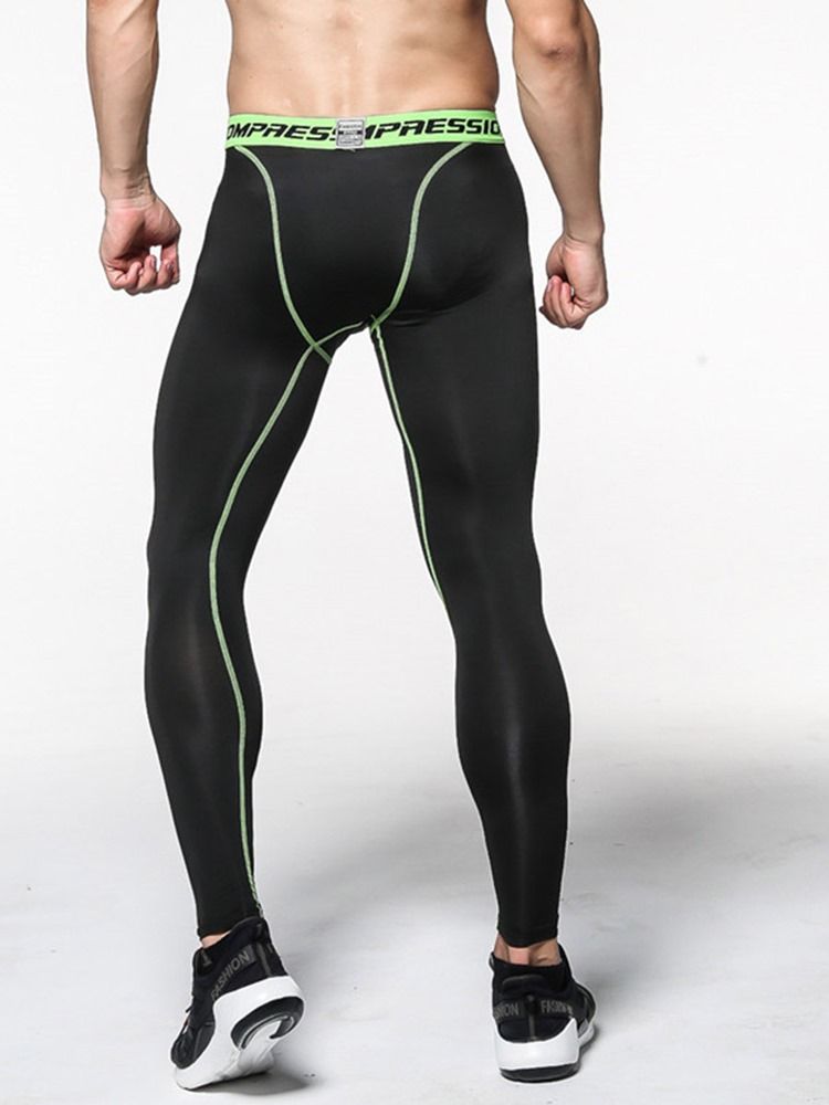 Män Anti-Svett Color Block Polyester Sport Leggings